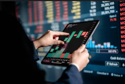 Investor reviewing stock charts